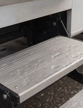 Applying anti-slip coating to an RV step to improve grip on wet surfaces